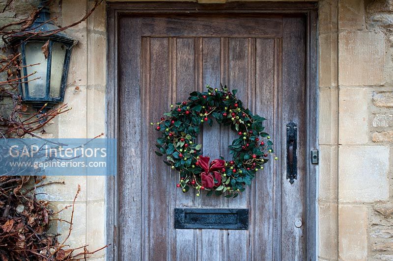 Christmas wreath on wooden door