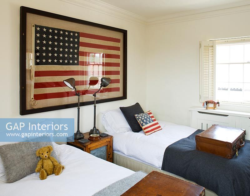 Guest bedroom with framed US flag