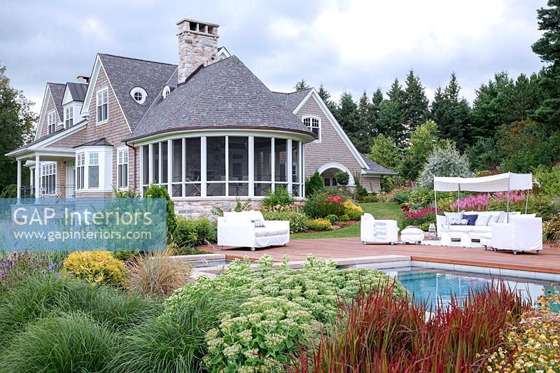Country house and colourful garden with pool