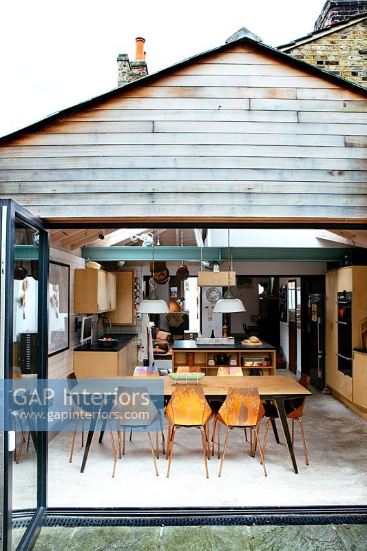 Modern kitchen extension with cedar clad walls