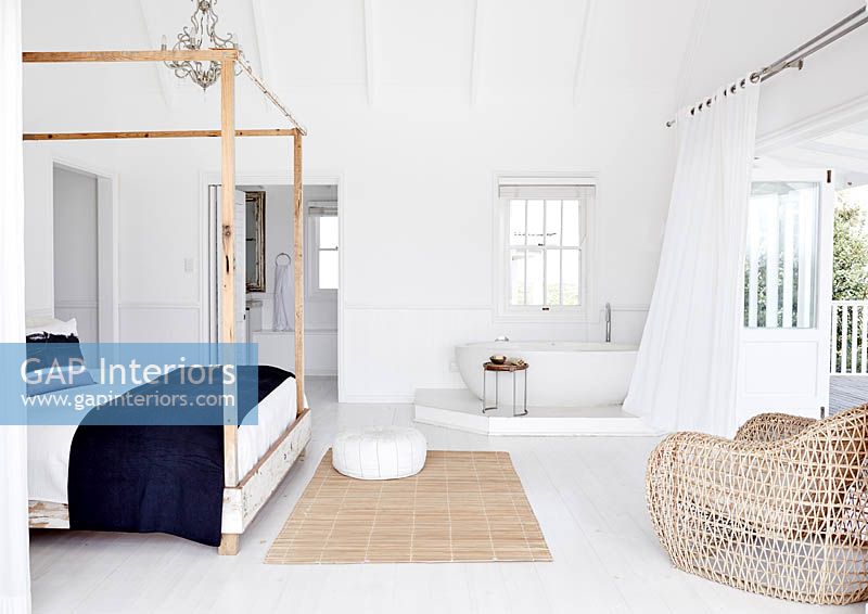 White bedroom with bath