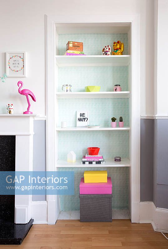 Colourful accessories on wooden shelves