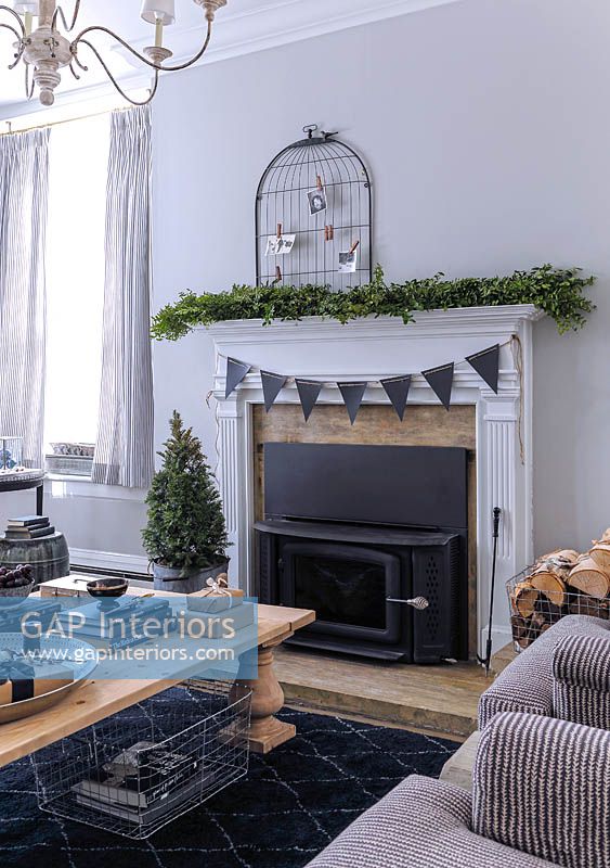Christmas decorations around fireplace