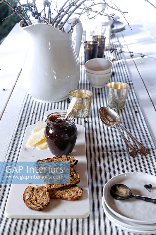 Bread and jam on dining table