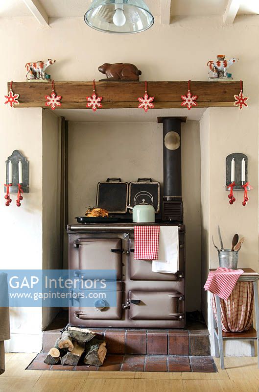 Range cooker surrounded by christmas decorations
