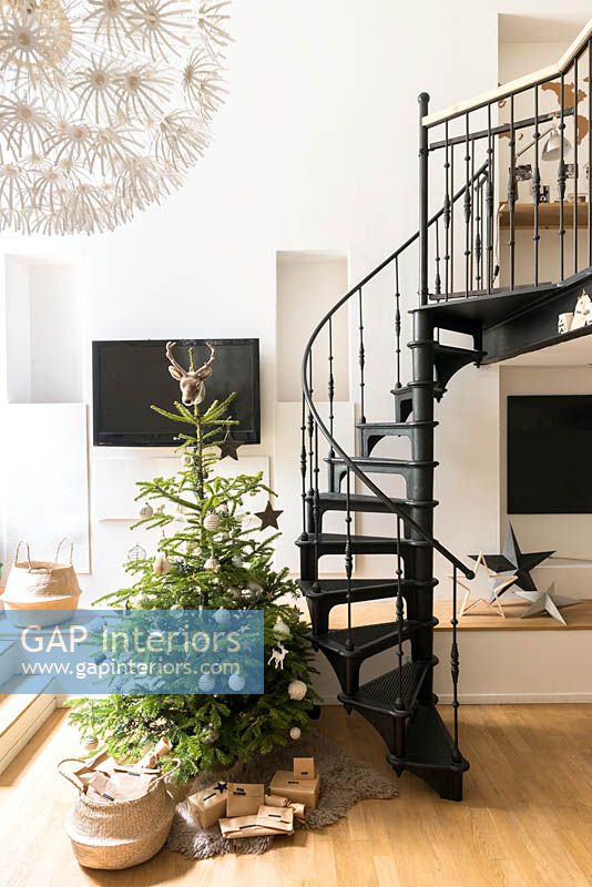 Christmas tree by spiral staircase