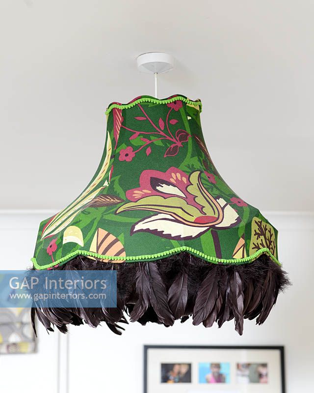 Pendant light with feather trim