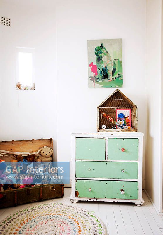 Vintage chests of drawers in childs bedroom