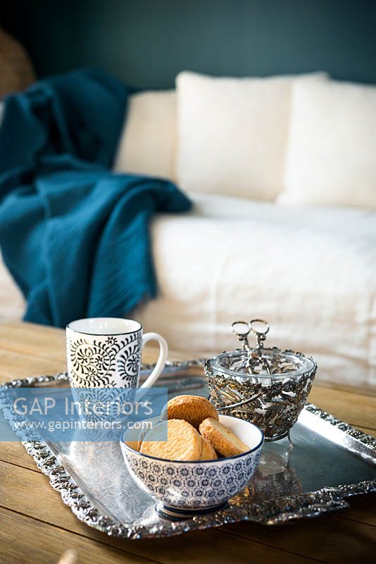 Tea and biscuits on silver tray