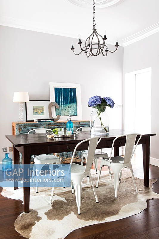 Metal chairs at dining table