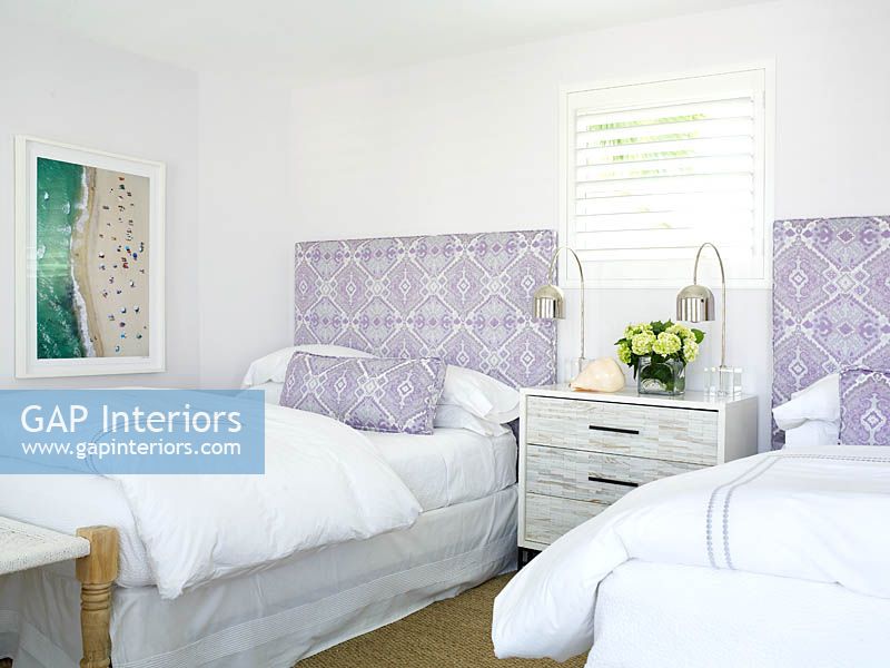 Patterned soft furnishings in bedroom