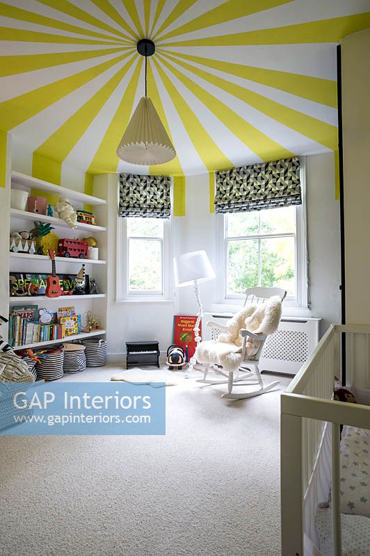 Childrens room with colourful ceiling