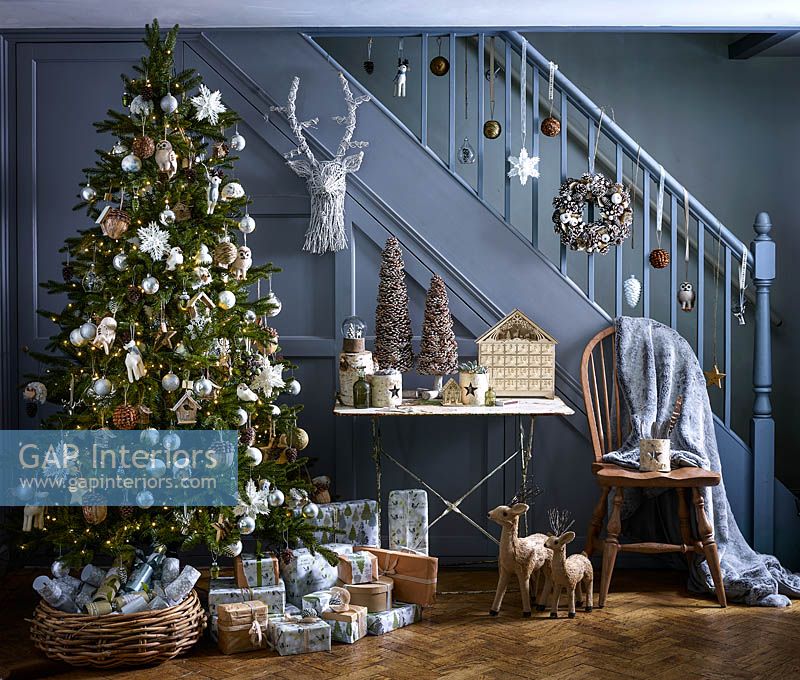 Christmas tree by staircase