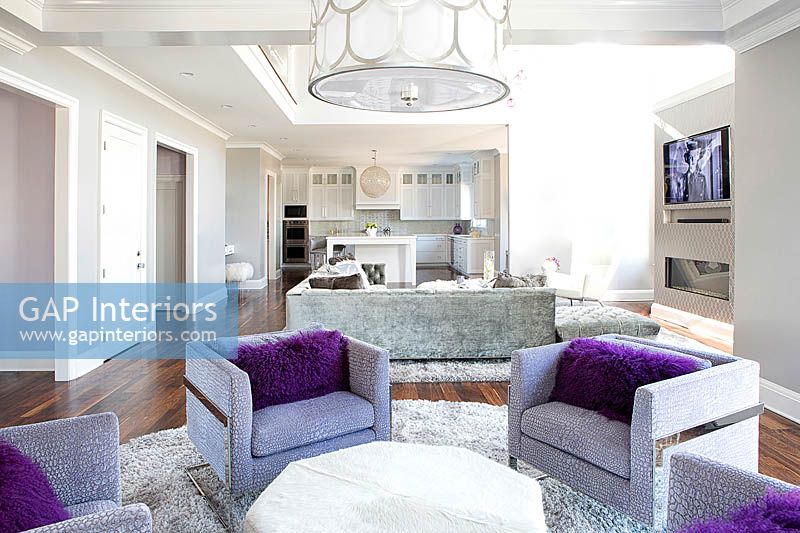 Square armchairs with purple cushions