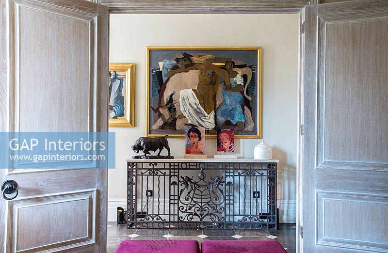 Metal console table with art display