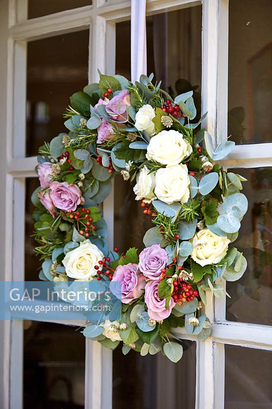 Front door with wreath of Roses and Eucalyptus foliage