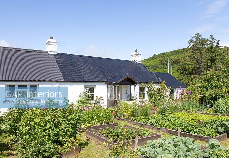 Cottage with vegetable garden