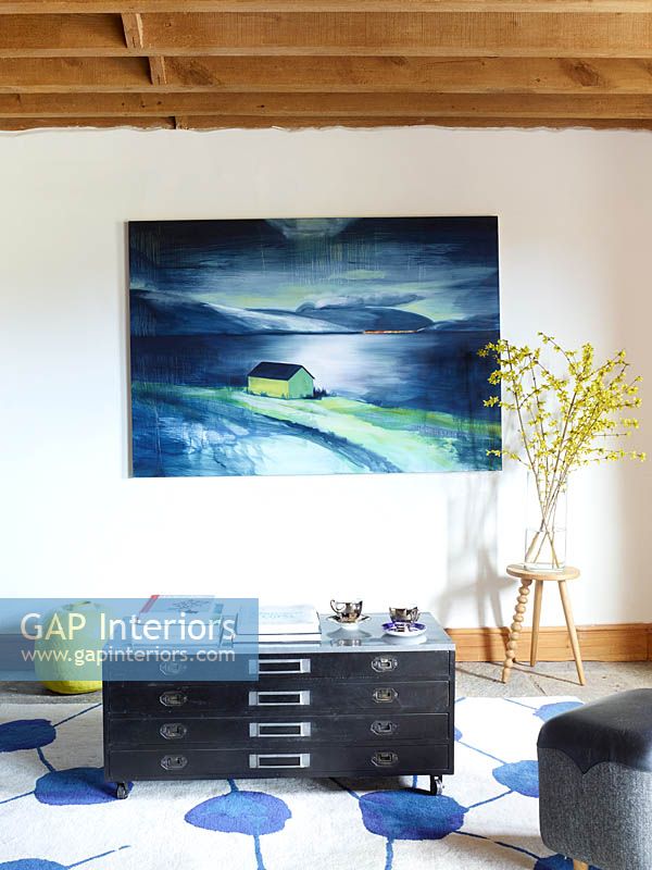 Landscape painting on living room wall by Catherine Knight