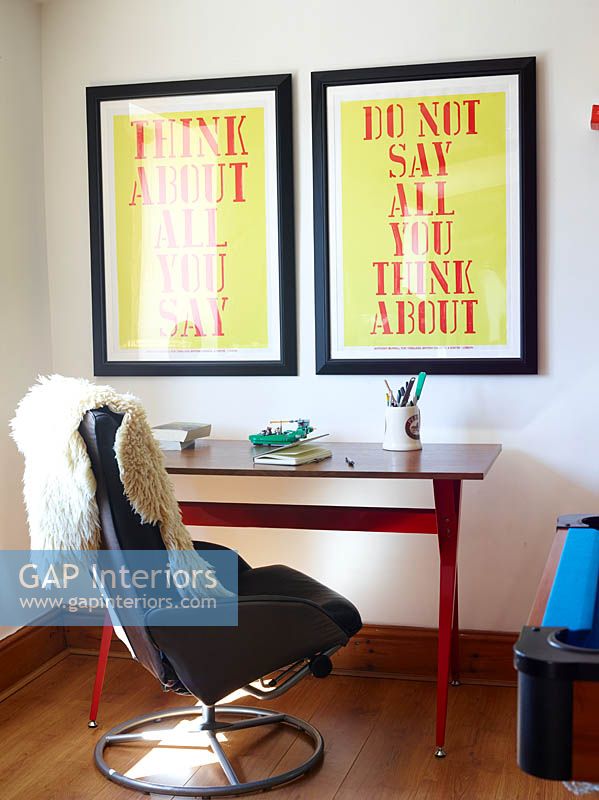 Eclectic study furniture, posters by Anthony Burrill