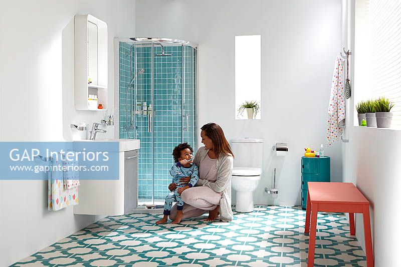 Woman and child in bathroom