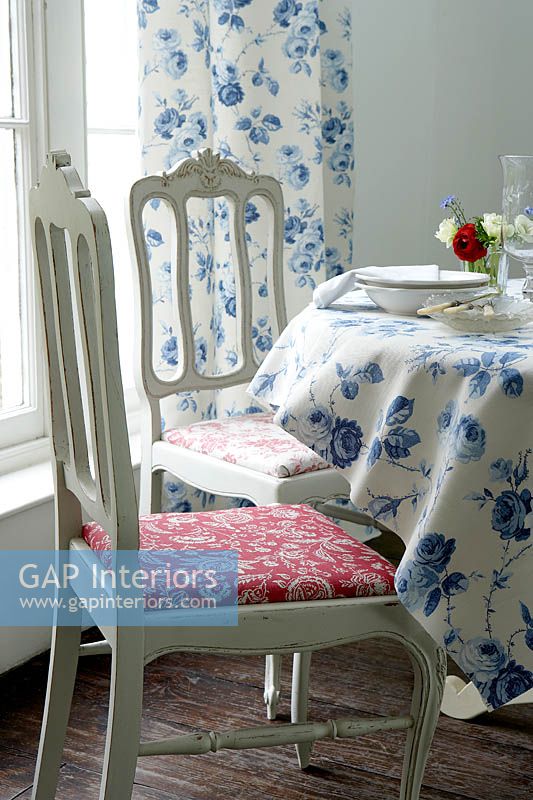 Colourful soft furnishings in dining room