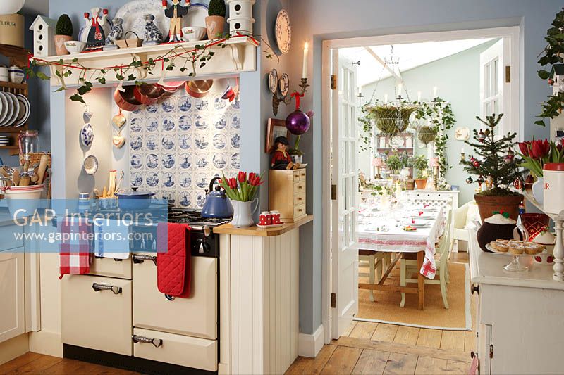 Country style kitchen and dining room decorated for christmas 