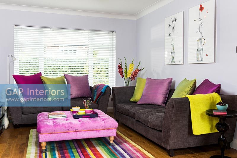 Colourful cushions on sofas