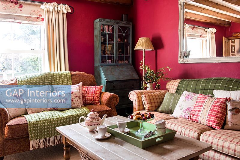 Colourful soft furnishings on sofas