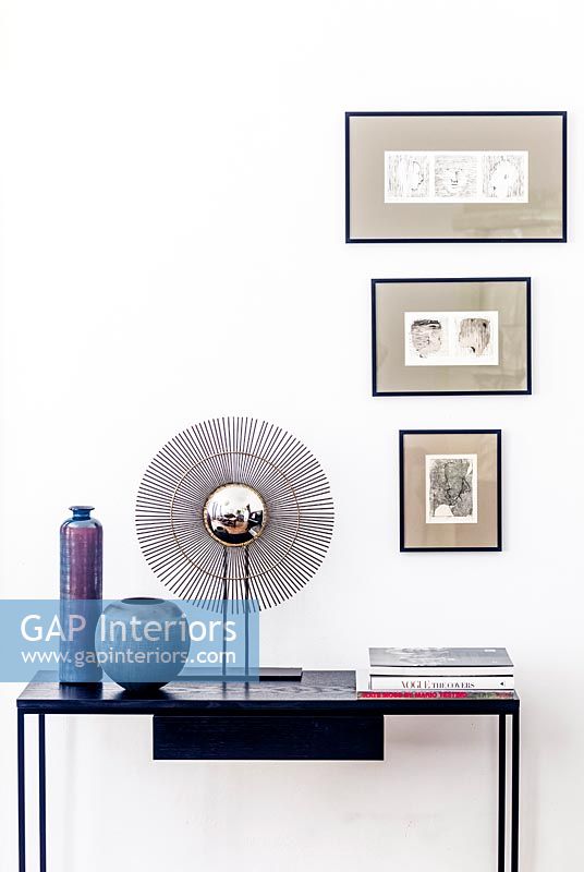 Modern accessories on console table