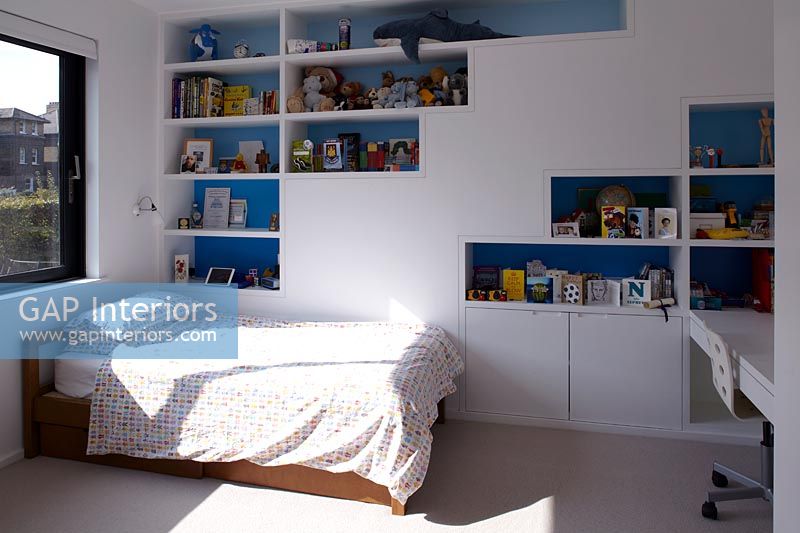 Childs bedroom with built in storage