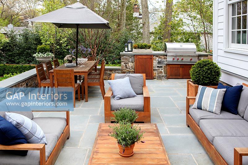 Modern patio with wooden furniture