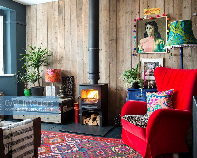 Colourful living room with wood burning stove