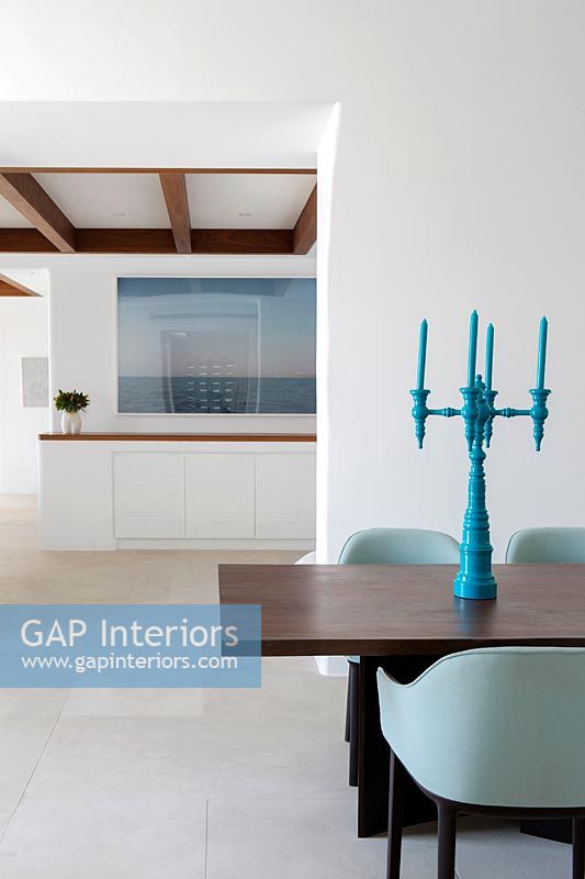 Turquoise candelabra on dining table