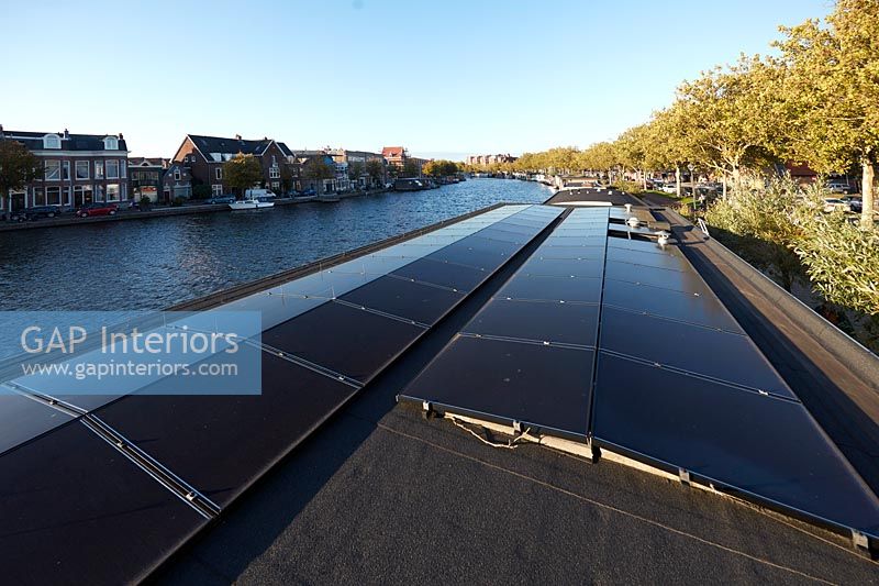 Modern houseboat roof with solar panels