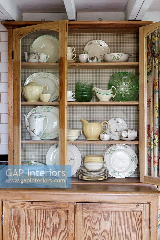 Country dresser with jugs, plates and ornaments