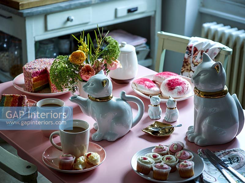 Kitchen tables with cakes 