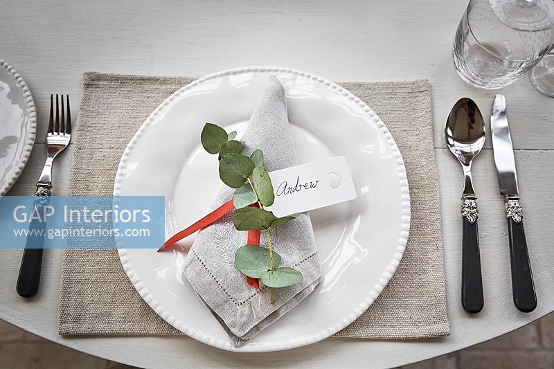 Dining place setting decorated for Christmas 