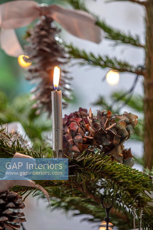 Silver candle and pine cone Christmas tree decorations 