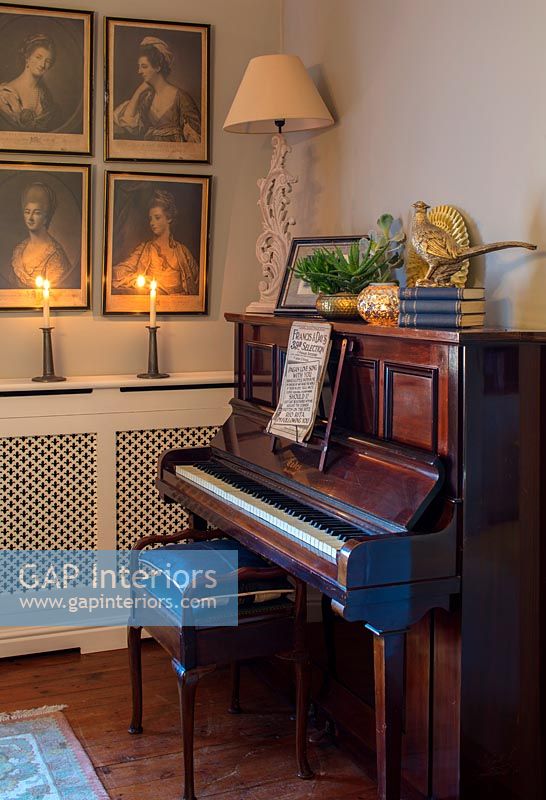 Upright piano in classic dining room 