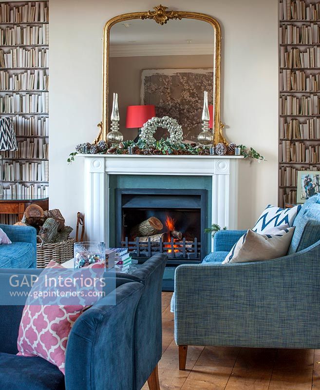 Wreath above fire place in classic living room 