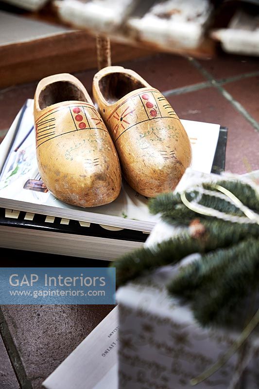 Close up Wooden clogs and Christmas gift
