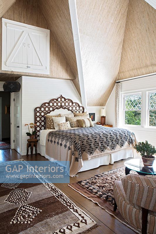 Country bedroom with vaulted ceiling 