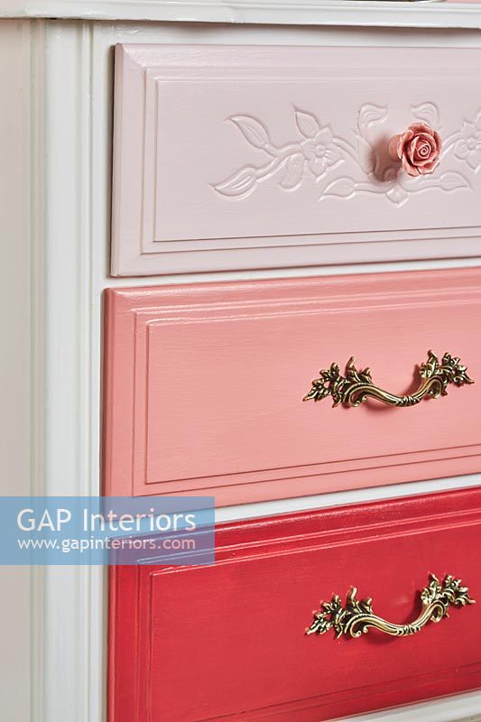 Chest of drawers with drawers painted in different colours 