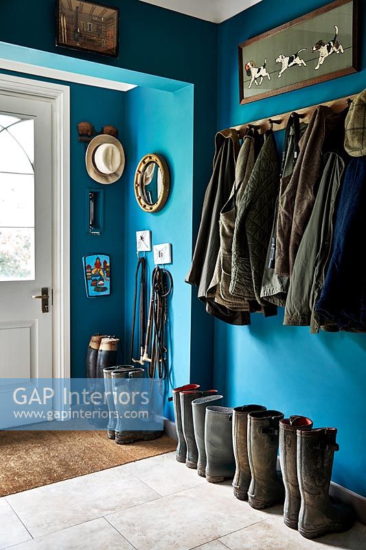 Blue painted country hallway 