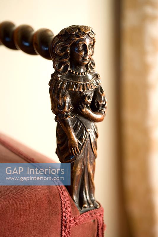 Traditional carved chair detail 