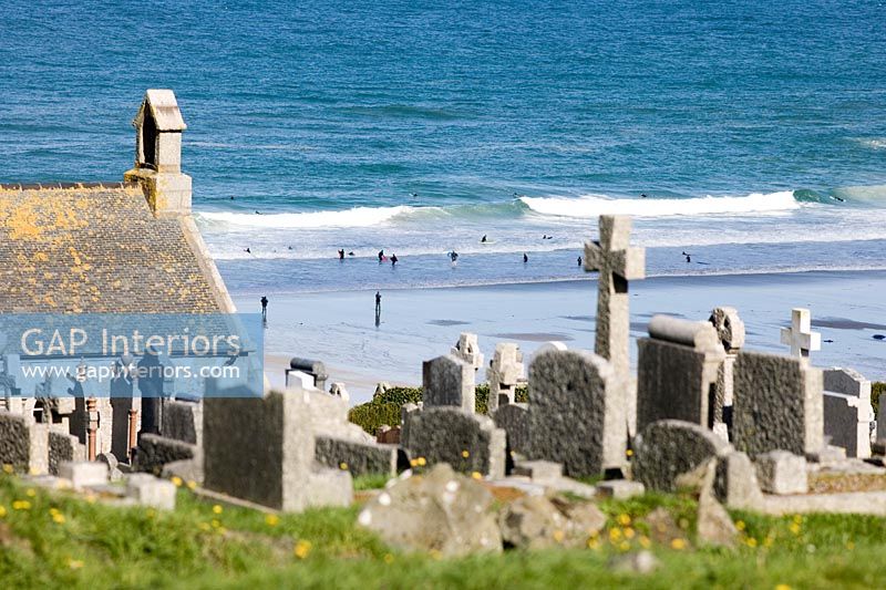 View of churchyard and beach  
