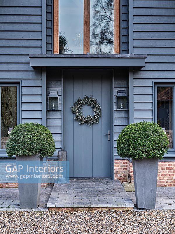 Country house exterior - Christmas wreath on front door 