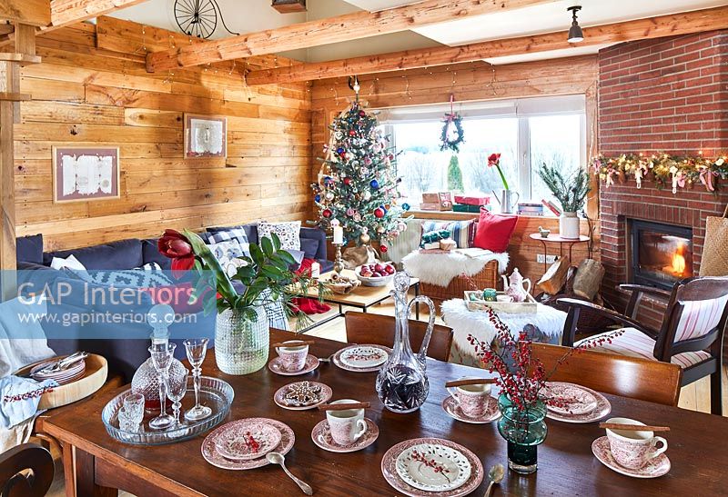 Modern country open plan living and dining space decorated for Christmas
