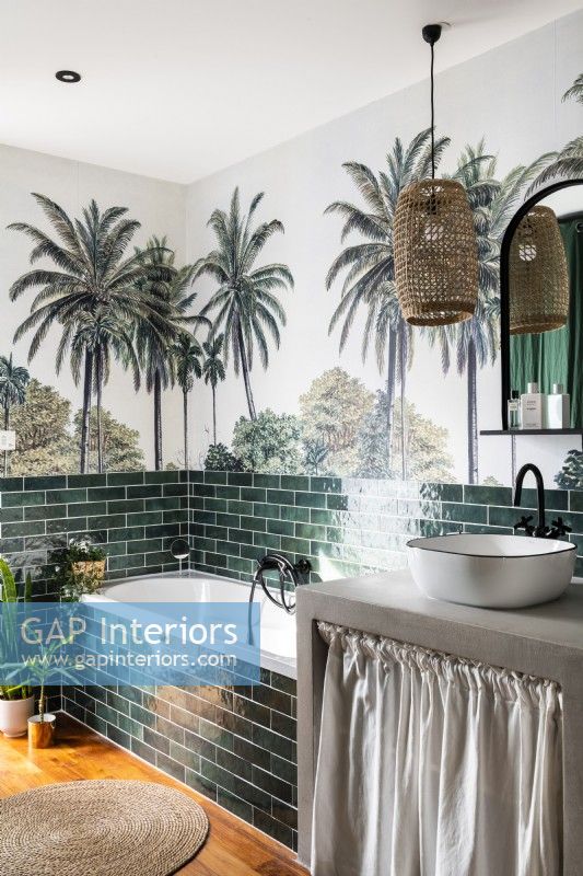 Modern bathroom with tropical scene mural on wall
