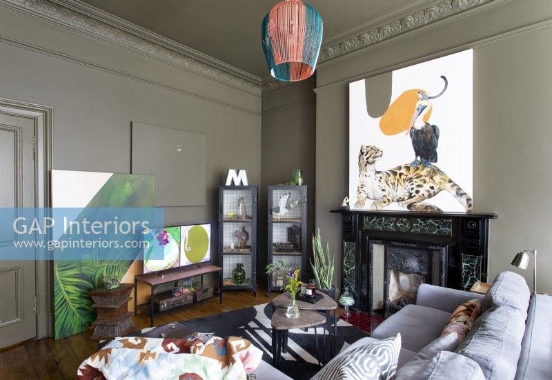 Eclectic living room with colourful artwork